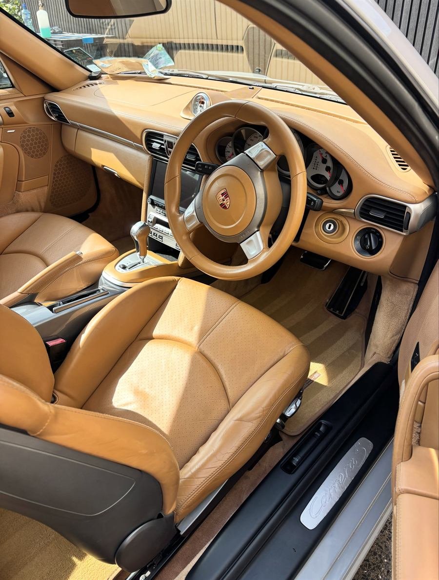 Tan leather Porsche interior after cleaning